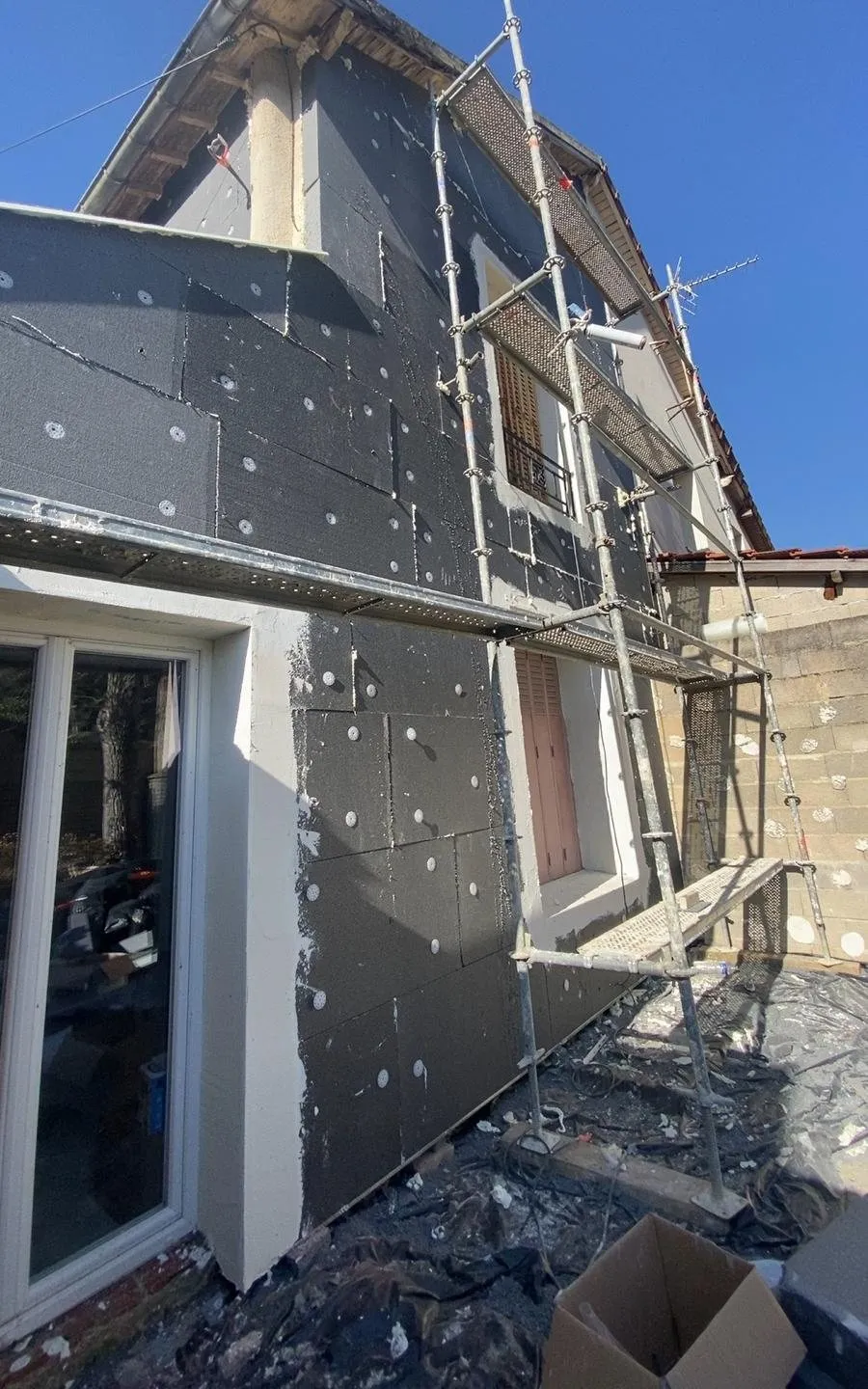 Isolation extérieure : pignon isolé sur deux niveaux